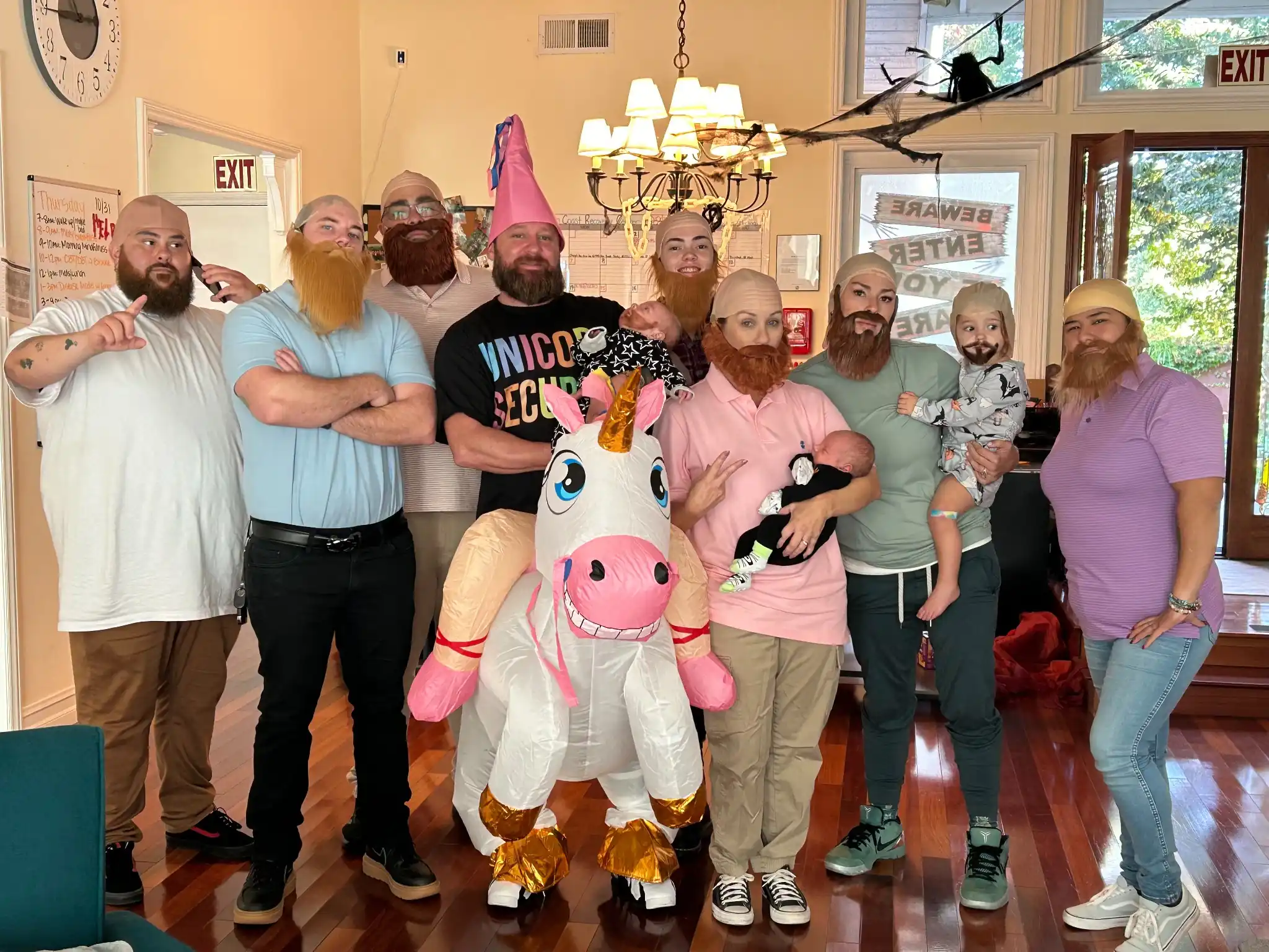 The Retreat Orange County team posing together in costumes, representing collaborative care in addiction treatment.